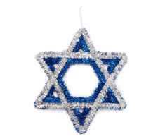 an ornament shaped like the star of david with blue and silver sequins