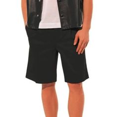 These Shorts From Prada's 2020 Spring And Summer Collection Are Made In A Black Sturdy Cotton, And Feature A Front 4-Button Fly With A Double Hook-Closure Bar, Belt Loops, A Pleated Waist, Front Slanted Pockets, Back Buttoned Welt Pockets, And A Bermuda Length. Condition: Great; Some Fading Throughout. Size: It 44 (Us 34) Approximate Measurements: Waist: 14.75" (37.5 Cm) Hips: 20.5" (52 Cm) Length (Inseam): 10" (25 Cm) Rise: 10.5" (27 Cm) Composition: Outside, Trouser Waistband, And Inside Pocket: 100% Cotton. Prada 2020, Welt Pockets, Welt Pocket, Summer Collection, Inside Pocket, Bermuda Shorts, Mens Shorts, Prada, Trousers