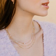 This necklace features fresh water pearls hand strung along a delicate chain. Choose 14kt gold filled or sterling silver, excellent quality that won't tarnish. A modern take on a classic pearl necklace. Simple, classic and beautifully made. Makes a great gift for a friend, family member, bridesmaids, or maybe just for yourself! Choose your length at check out, model wearing 17 inches long. Also checkout the matching bracelet: http://etsy.me/1QkR0y7 The beautiful necklace is perfect for your wedd Dainty Jewelry With Pearl Chain For Layering, Delicate Gold Pearl Necklace For Layering, Dainty Jewelry For Layering With Pearl Chain, Delicate 14k Gold Pearl Necklace With Delicate Chain, Delicate Pearl Chain For Layering, Delicate Everyday Pearl Necklace In 14k Gold, Delicate Everyday 14k Gold Pearl Necklace, Dainty 14k Gold Pearl Necklace With Delicate Chain, Everyday 14k Gold Pearl Chain Necklace