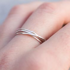 This delicate ring made of 4 tiny sterling silver bands is almost imperceptible on your hand. If you love minimalist and elegant jewelry, you'll love it! It perfectly matches any style and outfit. Each band is 0.8-0.9 mm thick and is relatively sturdy although the ring looks very dainty on the finger. Choose the metal for this ring - sterling silver or 9k gold. You see the ring of the 5.5 size in the pictures. You may order the ring of any size. If you are not sure about the size, this might be Delicate Adjustable Stackable Rings With Simple Design, Delicate Stackable Rings With Open Band, Dainty Stackable Adjustable Rings With Simple Design, Gift Midi Rings With A Modern Twist, Dainty Sterling Silver Midi Rings With Open Band, Dainty Sterling Silver Open Band Midi Rings, Dainty Midi Rings With Open Band And Simple Design, Simple Silver Stackable Rings In 14k Gold, Stackable Sterling Silver Bands