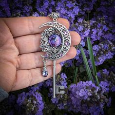 "This handmade fantasy moon key necklace is magical, indeed!  With an artsy crescent moon and high quality Swarovski crystals, this piece of fantasy jewelry will truly make you sparkle.  It would also make an excellent gift for lovers of fairies and magical things! The magical key pendant measures a generous 3\" tall and 1.5\" wide and will come on a silver toned chain in the length of your choice.  If you are unsure what length you need, I can add 2\" of additional chain to make it adjustable.  For example, I could make it 18\" to 20\" adjustable.  Just send me a note along with your order. Each piece is hand made and shipped from the United States in a free complimentary gift box! Thanks for looking and please check this key necklace out with blue crystals necklaces: https://www.etsy.com Magical Jewelry Pendants, Fantasy Jewelry Necklace, Key Magic, Fantasy Key, Fantasy Jewelry Magic, Magical Key, Celestial Witch, Fantasy Moon, Magic Necklace