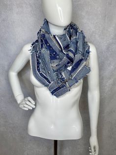 This denim ripped blue scarf made of recycled \ reworked jeans  with linen lining, decorated with metal elements.  Closure with lobster clasp. Handmade. Upcycled/reworked  jeans Inside out seams! One size. One copy. Unisex. Get Shredded! Ripped look. Materials:  linen, cotton Care: Dry clean or hand wash in cold water. Do not tumble dry. When choosing a scarf or shawl, consider it as a point of beginning the story of your image. This ripped scarf is combining everyday style with avantgarde designs with unexpected charm. You will never find two identical scarves, as they don't exist. Be different and stand out! Burning Man Accessories, Upcycle Denim, Reworked Jeans, Get Shredded, Design Scarf, Post Apocalypse, Blue Scarf, Burning Man, Everyday Style