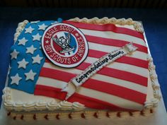 a cake decorated with an american flag and the seal of the united states on it