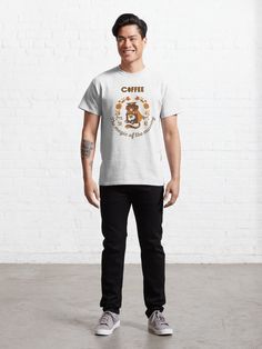 a man standing in front of a brick wall wearing a t - shirt with the words chiff on it