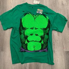 Nwt Hulk Chest T-Shirt Green Pop Culture T-shirt With Character Print, Green Cotton Pop Culture T-shirt, Green Pop Culture Graphic Print Tops, Pre-shrunk Green Pop Culture T-shirt, Green Pre-shrunk Pop Culture T-shirt, Green Short Sleeve Shirt With Character Print, Green Cotton T-shirt With Character Print, Green Pop Culture Tops With Character Print, Green Fan Merchandise T-shirt With Front Print