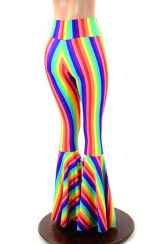 "This item is made to order, please read all the way through the listing before purchasing! These leggings are made of top quality lycra spandex, in a gorgeous rainbow stripe print. They have a smooth stretch waistband that sets high at the natural waist for a sleek anti muffin top fit. They flare out super wide below the knee! Rise: 11\" Choose your own inseam length. (Standard inseam is 32\") If your inseam isn't an option, simply add it into the \"notes\" section at checkout! Inseam is measur Rainbowcore Fashion, Flares Leggings, Pride Clothes, Funky Leggings, Rainbow Skirt, Flare Legging, Wideleg Pants, Flared Leggings, Pride Outfit