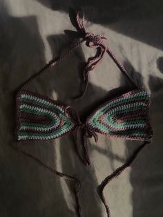 Size x small brown and olive green handmade crochet bikini top great for summer! can be worn as a bikini top, bralette, or even a festival top not recommend as your average swimwear but great for tanning or a quick dip in the pool🌞 each cup is 6 1/2" across Sizing ~ cup width A-XS (5"-5 1/2") B-S (6"-6 1/2") C-M (7"-7 1/2") D-L (8"-8 1/2") Brown Crochet Beach Top, Beach Brown Crochet Top, Brown Crochet Top For Beach, Beach Crochet Top In Brown, Brown Summer Halter Top For Festivals, Quick Dip, Festival Tops, In The Pool, Tanning