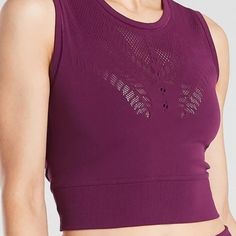 Pretty Plum Workout Top, Nwt And In Perfect Condition. Chafe-Free Seamless Fabric Stretches With Movement, And Delicate, Open Hole Mesh Provides Airflow. Fitted, Crop Length. Length: 15.5" 81% Nylon, 19% Spandex Machine Wash And Dry Sporty Sleeveless Seamless Crop Top, Sporty Sleeveless Crop Top With Seamless Design, Sporty Seamless Sleeveless Top, Seamless Sleeveless Athleisure Top, Sleeveless Seamless Athleisure Top, Athleisure Seamless Sleeveless Top, Seamless Racerback Athleisure Top, Athleisure Seamless Racerback Top, Seamless Sleeveless Gym Top