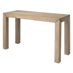 a wooden table sitting on top of a white floor