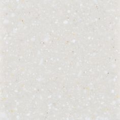 a white background with gold speckles on it