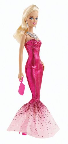 the barbie doll is wearing a pink dress