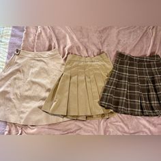 Euc You Get 3 Skirts, One Is From H&M And Is Nwt, She’s A Size 2 And Is A Pretty Suede Like Fabric. The Other 2 Are From Shein In Euc, They Are Size Xs. Please Review The Pictures Carefully As They Are Part Of The Description. Make Me An Offer! Bundle 2 Or More Items From My Closet And Save 15% Automatically! Thank You For Checking Out My Closet H And M Skirts, Cheap H&m Skirt, Cheap Khaki Mini Skirt, Cheap Lined Mini Skirt From H&m, Cheap Brown Pleated Mini Skirt, Cheap Cotton Mini Skirt By H&m, Tan Brown, Size 2, Product Description