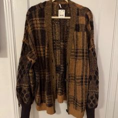 Free People Cardigan Sweater. Size Is Medium, But It's A Very Oversized Fit. Fabric Is Super Warm And Soft. Would Be Cute With A Tank Top Underneath And Have The Sweater Be Worn Hanging Off Your Shoulder. Oversized Plaid Long Sleeve Cardigan, Oversized Plaid Casual Cardigan, Oversized Casual Plaid Cardigan, Plaid V-neck Cardigan For Fall, Casual Oversized Plaid Cardigan, Oversized Plaid Winter Cardigan, Oversized Plaid Cardigan For Winter, Plaid V-neck Outerwear For Fall, Oversized Plaid Sweater For Fall