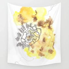 a yellow and brown abstract painting on a white wall hanging from the side of a room