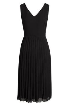 Designed in a sleeveless silhouette, this day-to-night dress is punctuated with a pleated chiffon skirt. 46" length (size 8) V-neck Sleeveless Lined 100% polyester Dry clean Imported Elegant Black Pleated Dress, Black Pleated Bodice Dress For Evening, Elegant A-line Sleeveless Dress With Pleated Hem, Classic Black Pleated Evening Dress, A-line Pleated Dress For Date Night, Elegant Black Pleated Dress With Accordion Pleats, Formal Black Pleated Dress With Pleated Waist, Formal Black Pleated Dress, Formal Black Dress With Pleated Waist