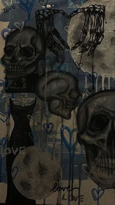 a painting with skulls and other things on it