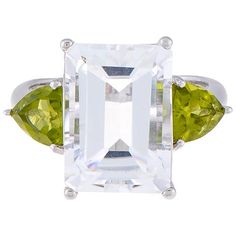 Elevate your style with the timeless elegance of the Radiance by Absolute Sterling Silver Quartz and Peridot Emerald-Cut 3-Stone Engagement Ring. This exquisite piece is a perfect blend of sophistication and sparkle, ideal for any occasion.

- Material: Sterling Silver (.925 stamped)
- Stones: Arkansas Quartz (Emerald-cut, 8.05ct), Arizona Peridot (Trillion-cut, 1.28ct)
- Dimensions: Approx. 15/16"L x 3/4"W
- Color: Silver
- Size: 11
- Gender: Female

Crafted with precision, the ring features a Elegant Three Stone Peridot Ring, Peridot Engagement Ring, Peridot Engagement Rings, 3 Stone Engagement Rings, Color Bands, Stone Engagement Rings, Stone Engagement, Engagement Ring Styles, Touch Of Modern