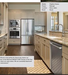 a kitchen with white cabinets and stainless steel appliances in it's center island area