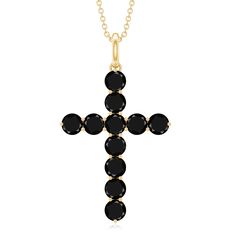 Product Details This Cross Pendant is a symbol of faith and devotion that she can wear every day with pride. The pendant features a graceful cross, skillfully crafted from Gold, that shimmers with an elegant Black Onyx gemstone in a secure Prong Setting. The timeless and classic design of this pendant ensures that it will remain a cherished accessory for years to come. This beautiful Cross Pendant is a perfect way to express ones faith and devotion, and it makes for a thoughtful and meaningful g Black Diamond Necklace, Beautiful Cross, Holy Cross, Diamond Cross Pendants, Onyx Gemstone, Diamond Cross, Signature Jewelry, Timeless Jewelry, Cross Pendant Necklace