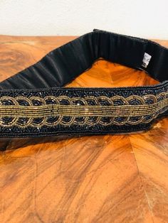 "Cumberbund belt, beaded belt, Black, Gold, Amber, Medium, Cumber Bun Velcro close Measurements: Width 2\" length 33\" Excellent condition, unused AJ904 Cumberbund belt, beaded belt, Black, Gold, Amber, Medium, Cumber Bun" Formal Black Embroidered Belt, Vintage Adjustable Belt For Party, Adjustable Vintage Party Belt, Adjustable Black Embroidered Belt, Black Embroidered Adjustable Belt, Black Bohemian Embroidered Belt, Elegant Adjustable Belts For Festivals, Bohemian Black Embroidered Belt, Elegant Festival Belts