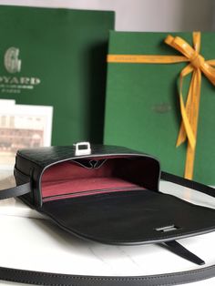 The most classic characteristics of Belvédère bags: simple and elegant, light and practical. The single narrow belt buckle passes through the metal ring smoothly, and can be opened and closed freely; the leather trim highlights the outline of the bag body in a linear way, and the leather lining of the flap also makes the silhouette of the bag more three-dimensional. The Belvédère 2 bag has three internal pockets to securely organize daily essentials and has an adjustable shoulder strap that can Designer Rectangular Saddle Bag For Travel, Classic Black Saddle Bag With Palladium Hardware, Classic Bags With Metal Hardware For Everyday Luxury, Designer Black Saddle Bag For Business, Luxury Rectangular Saddle Bag For Office, Luxury Black Saddle Bag With Metal Hardware, Formal Leather Shoulder Bag With Rectangular Buckle, High-end Rectangular Shoulder Bag With Metal Hardware, Designer Saddle Bag For Business