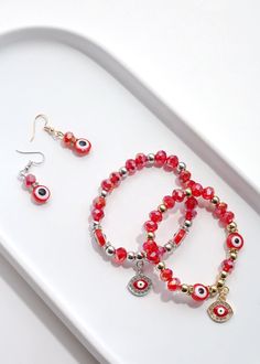 Symbolizes protection, happiness, good fortune and prosperity It is stylish and creative, full of warm meanings Symbolic Drop Earrings Jewelry As Gift, Symbolic Drop Earrings Jewelry Gift, Symbolic Drop Earrings As A Gift, Red Beaded Jewelry For Gifts, Red Jewelry With Colorful Beads For Gift, Gift Red Jewelry With Colorful Beads, Eye-catching Dangle Jewelry For Gifts, Adjustable Spiritual Jewelry Sets For Gifts, Eye-catching Handmade Jewelry For Gifts