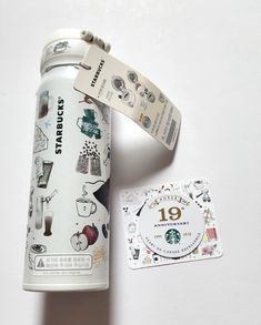 a starbucks coffee can with its tag attached to it