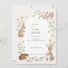 a baby shower is shown with rabbits and flowers on the front, and in the back