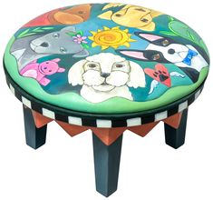 a small stool with an animal theme painted on it