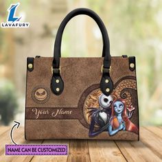 Custom Name Jack Skellington Pattern Brown Leather Premium Leather Handbag It’s a practical accessory for fashion-conscious individuals on the go and makes an excellent gift choice for special occasions. The bag is crafted with care and attention to detail, made of high-quality PU leather with a soft microfiber layer that protects your belongings. It features two zippered pockets, one flat pocket, and one detachable pocket, making it ideal for organizing your essentials. The bag is spacious enou Large Capacity Satchel Bag As Gift, Trendy Double Handle Satchel As Gift, Trendy Personalized Bags For Personal Use, Trendy Handheld Satchel For Gift, Trendy Handheld Bag For Personal Use, Personalized Black Bag For Shopping, Personalized Black Shopping Bag, Brown Bag With Removable Pouch As Gift, Gift Satchel Bag With Removable Pouch