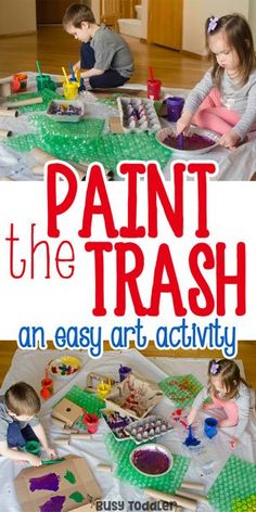 two children are playing with paints and paper on the floor, while another child is sitting at