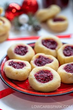 some cookies are on a red and black plate