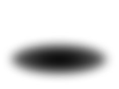 a black hole is shown in the middle of a white background with light coming from it