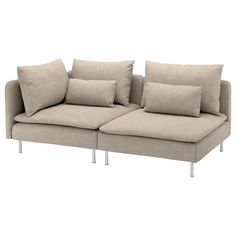 a gray couch with pillows on it and some metal legs in front of white background