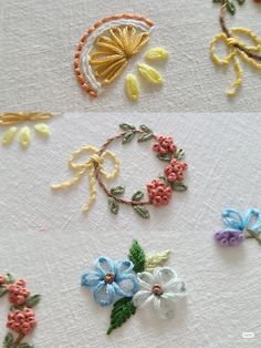 four different types of flowers on white fabric