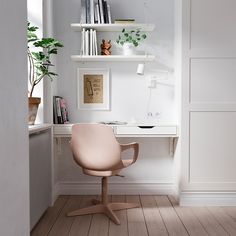 a white desk with a chair and bookshelf in the corner next to it