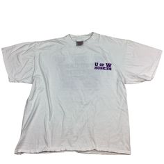 Vintage Washington Huskies "If you can 'T beat 'em, Ban 'em" Tshirt. Made in the USA. High quality. Large back graphic. Tagged as an XL. 23 inches pit to pit, 27 inches long. Overall excellent vintage condition, no rips or tears. Does have a light discoloration mark on the bottom as shown in last photo, may come out. Smoke and pet free home. University of Washington. Huskies. Seattle. 90s. UDUB. Washington Huskies Wallpaper, White Vintage Print Band Merch T-shirt, Washington Huskies Football, Vintage Alaska Sweatshirt, Washington Huskies, University Of Washington, Mens Graphic Tee, Mens T, Seattle