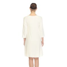 This casual easy going dress will carry you through all stages of your pregnancy. Features a crisscross neckline, three-quarter sleeves, and a trapeze silhouette for a chic and classy look. Made from a super soft and stretchy fabric that is loose fitting for your ultimate comfort. Pairs well with sandals or heels. Maternity Dress With 3/4 Sleeves, Trapeze Silhouette, Heels White, Cross Neck, Womens Maternity, Soft Skin, White Mark, Formal Looks, White Midi Dress