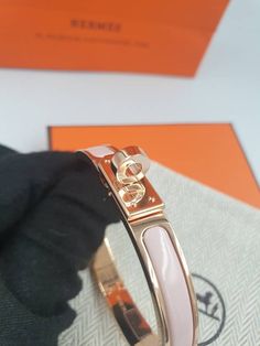 Gender: Women Brand: HERMES Product Name: Mini Click Kelly Bracelet Pink Rose Gold PM H200004FO1Z Bags Alora Code: 83631030 Color: pink Origin: France Designer Style ID H200004FO1Z Kelly Bracelet, Jewelry Accessories Ideas, Accessories Ideas, Timeless Handbag, Pink Bracelet, Luxe Fashion, Bags Designer Fashion, Designer Style, Pink Rose