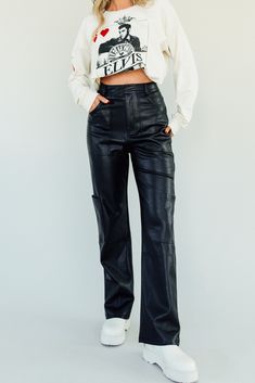 If you're a TikTok girly you have come across "Mob Wife Aesthetic" and we are here to tell you that you are going to need these to achieve the perfect mob wife aesthetic look. Leather pants are honestly such a necessity in every girl's wardrobe. You can dress them up or down easily and they are the best go-to when you need to look put together and hot as hell. Pair them with a graphic tee, a sweater, crop top, oversized tee, add a long white tee and a pullover. There are so many options here and Tiktok Girly, Mob Wife Aesthetic, Wife Aesthetic, Look Put Together, Mob Wife, Black Leather Pants, Sweater Crop, Aesthetic Look, High Waisted Flares