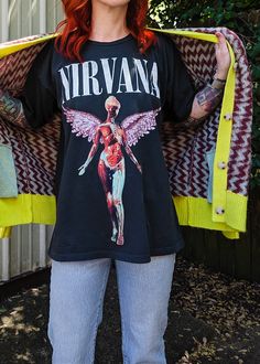 Takin' it back to 1993 with this killer Nirvana In Utero tee! Vintage black colorway. Super soft with a look and feel like you picked it up from the merch table in '93. This tee is Daydreamer's signature Merch tee style: intentionally oversized and meant to fit like that perfect vintage find with a perfect drape and single stitch hems. Also available in a Yellow Mist colorway. Features: Made from a 100% cotton fabric, feels like a luxury tour shirt with the perfect drape Roomy, oversized fit wit Nirvana In Utero, Merch Tee, In Utero, All Black Everything, Skirt Jumpsuit, Tour Shirt, Girl Bands, Nirvana, Vest Dress