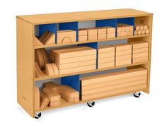 a wooden shelf filled with lots of boxes