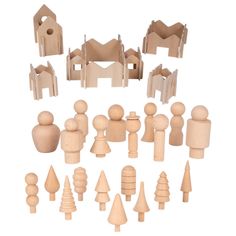 wooden toys are arranged in the shape of houses and trees on a white background with clippings