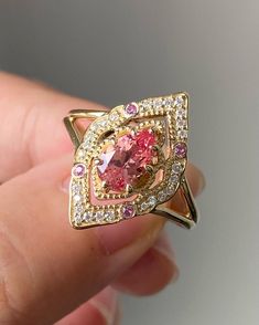 Art Deco Ring, Halo Bezel Set Engagement Ring, Pink Ruby Pear Cut Wedding Ring, Amethyst Round Cut Ring, Double Shank Milgrain Ring, 14KGold Item Description: Stone - Simulant Diamond Stone Shape- Pear & Round Cut  1. White Gold: 10K/14K/18K 2. Yellow Gold: 10K/14K/18K 3. Rose Gold: 10K/14K/18K 4. Silver: Sterling Silver 925 Size Customization: What Size you want... * You can also Customize ring size in US 4 to US 12! It sometimes affects to price. * Main Stone & Shape Customization: Main Stone: Cubic Zirconia, Moissanite, Natural Diamond, CVD Diamond Shape Choice: Round Cut, Heart, Princess Cut, Pear Cut, Cushion Cut, Marquise, Oval Shape, Asscher, Emerald, Radiant, Old European Cut, Old Mine Cut * Check out Special Notes: At checkout, leave us a note in the message box for the Ring size Milgrain Ring, Special Letters, Bezel Set Engagement Ring, Cvd Diamond, Pear Cut, Eco Friendly Jewelry, Art Deco Ring, Round Cut, Diamond Stone