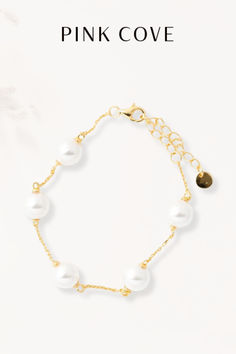 Elegant Spaced Pearl Bracelet from Pink Cove: Timeless Gold Pearl Jewelry for Bridal or Everyday Wear. Discover this chic and sophisticated piece, perfect for enhancing your style. Shop now for the must-have gold pearl bracelet. Elegant White Chain Bracelet With Extender, Elegant Adjustable Hypoallergenic Gold Bracelet, Elegant Gold Pearl Bracelet Hypoallergenic, Elegant Hypoallergenic Chain Bracelet, Elegant Hypoallergenic Round Chain Bracelet, Classic White Adjustable Chain Bracelet, Elegant Hypoallergenic Gold Bracelet, Classic White Tarnish Resistant Bracelets, Classic White Tarnish-resistant Bracelets