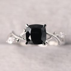 ◆ The ring is handcrafted from sterling silver and decorated with a dazzling 7*7 mm natural black spinel and cz. It is suitable for engagement/anniversary/daily occasion. ◆ Production Description: Main stone Type: Natural black spinel Main Stone Shape: Cushion Cut Main Stone Size: 7x7 mm(2.18 ct) Side stone: Marquise cut cz Metal: 925 Sterling silver - Other options available in the drop down menu ◆ Customization: √Free for Add Engraving √Other Metal Type Available √Other Gemstones & Shapes Avai Black Jewelry For Anniversary, Classic Black Spinel Sapphire Ring For Anniversary, Elegant Black Sapphire Ring With Center Stone, Classic Black Spinel Ring For Anniversary, Classic Black Spinel Diamond Ring For Anniversary, Black Diamond Ring With Diamond Accents For Wedding, Black Diamond Rings With Accent Stones, Black Diamond Wedding Ring With Diamond Accents, Black Diamond Wedding Ring With Accents