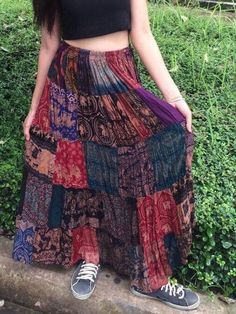 "Light and flowy, this Skirt is made from a patchwork of rayon cotton fabric with Elastic waist. Comes in Assorted Colors and Patterns, no two are the same, each skirt is as unique as the person wearing it. Size: One Size Fit Most 0-0-0--- -- Waist 23\" stretching to 40\" (with ELASTIC waist) Hip : FREE Material:. 100% Rayon  ** Because the fabric squares are chosen at random, the pattern position of each skirt is unique but equally beautiful. Please note that since our products is handmade, mea Hippie Skirt, Boho Patchwork, Boho Embroidery, Boho Mode, Hippie Skirts, Maxi Rok, Hippie Style Clothing, Patchwork Skirt, Skirt Maxi