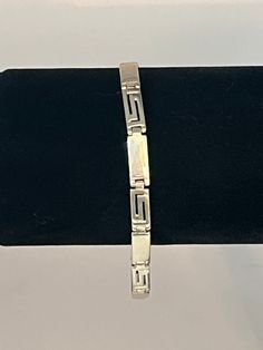 Very pretty silver rectangle link bracelet.  Measures about 7.75 inches.  Stamped '925' and number '3597'.  Looks elegant and suitable with any outfit. Classic Chain Bracelet With Rectangular Links For Anniversary, Classic Rectangular Bracelets For Anniversary, Elegant Sterling Silver Rectangular Chain Bracelet, Elegant Silver Bracelet With Rectangular Links, Elegant Rectangular Sterling Silver Chain Bracelet, Elegant Silver Rectangular Link Bracelet, Anniversary White Gold Rectangular Bracelet, Classic Rectangular Sterling Silver Chain Bracelet, Formal Sterling Silver Bracelet With Rectangular Links