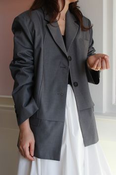 This oversized blazer features a unique layered design and a double button closure. Oversized Blazer With Notch Lapel And Hidden Button Closure, Oversized Notch Lapel Blazer With Double Button Closure, Oversized Blazer With Double Button Closure, Spring Oversized Double-breasted Blazer, Oversized Double-breasted Long Sleeve Blazer, Cut Blazer, Oversized Blazer, Best Wear, Layers Design