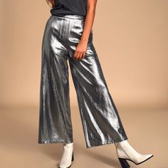 -Silver Metallic Wide Leg Cropped Pant -High Waisted -95% Polyester/5% Spandex -Brand New Never Worn! Metallic Sheen Pants For Party, Party Pants In Metallic Color With Sheen, Metallic Party Pants With Sheen, Glamorous Metallic Bottoms With Sheen, Glamorous Metallic Sheen Bottoms, Glamorous Party Bottoms With Sheen, Glamorous Sheen Bottoms For Party, Metallic Shiny Bottoms For Party Season, Glamorous Pants With Sheen For Night Out